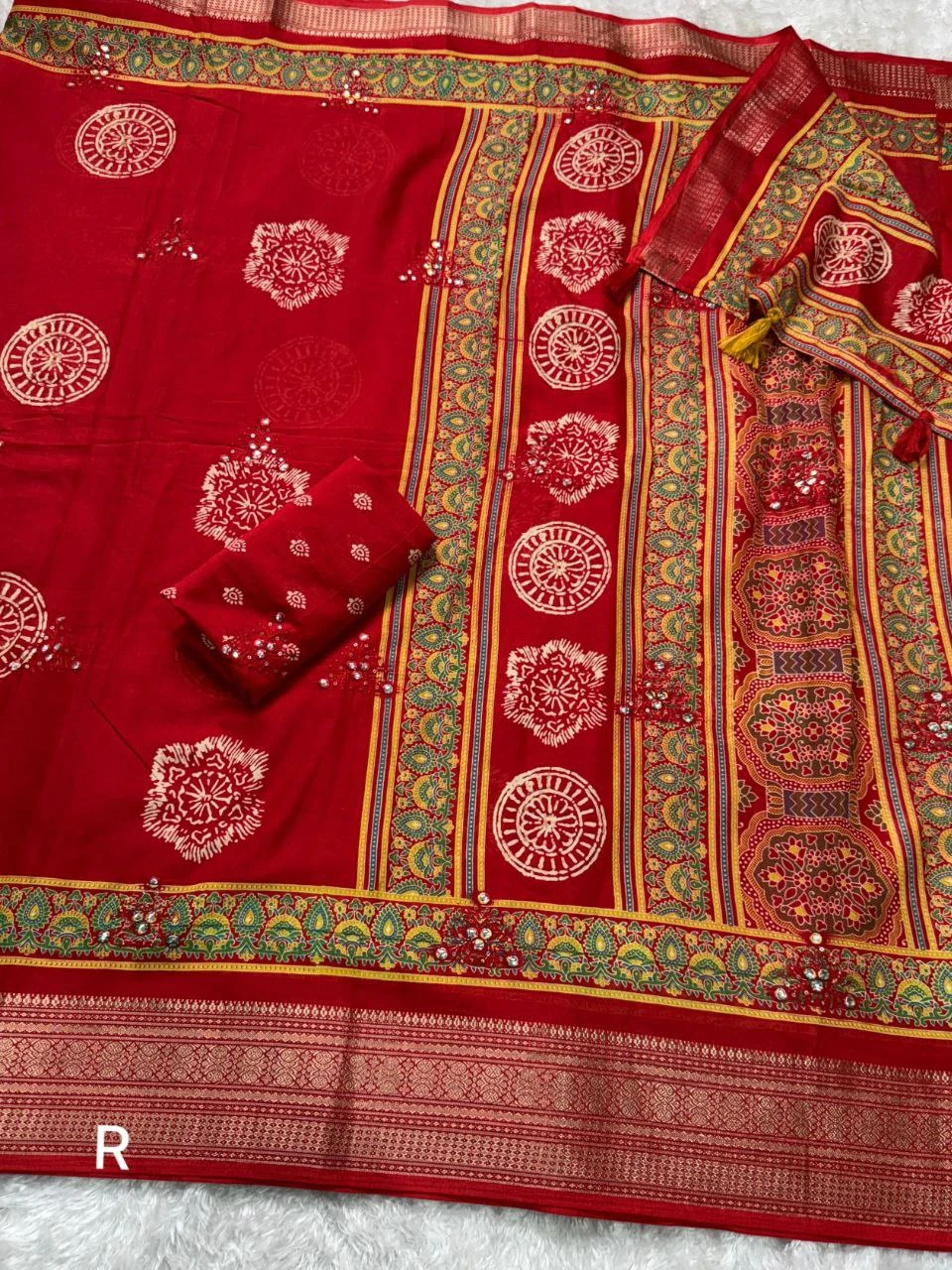 Effortless elegance meets vibrant charm with this Designer ajrakh printed beauty