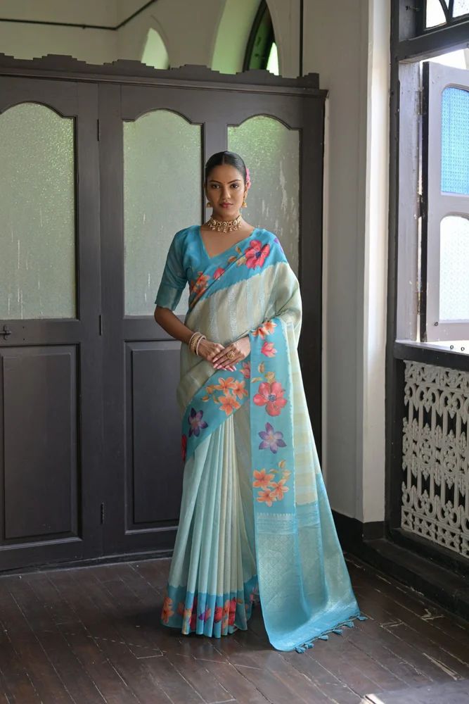Unique flower printed border with contrast rich zari pallu saree