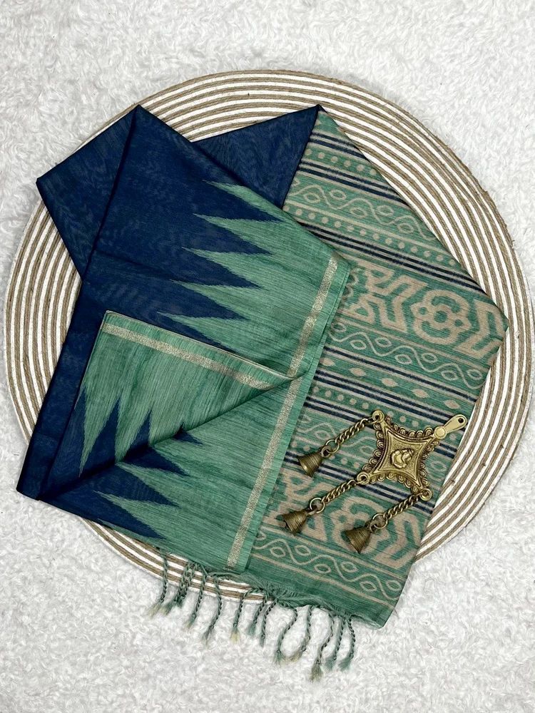 Soft Tussar silk saree with beautiful temple border and ikkat print pallu